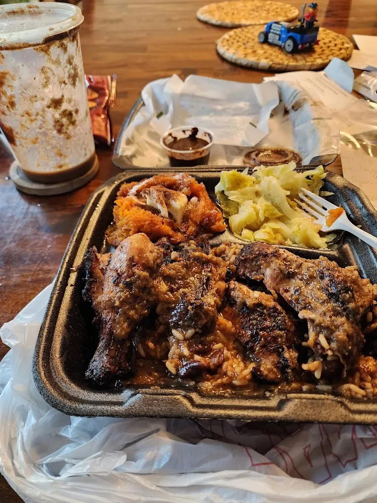Half Jerk Chicken with Cabbage Sweet Potatoes and Red Beans and Rice